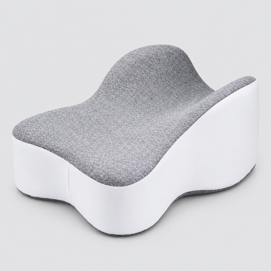 Almohada viscoelástica contorneada para piernas, gris y blanca